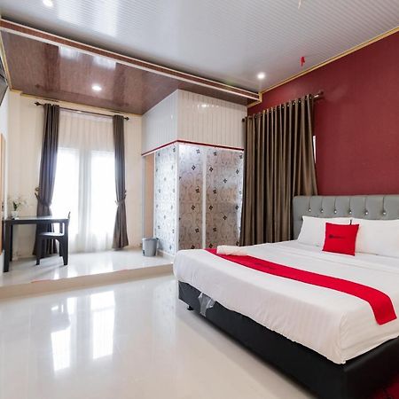 Отель Reddoorz Syariah Near Minangkabau International Aiport Паданг Экстерьер фото