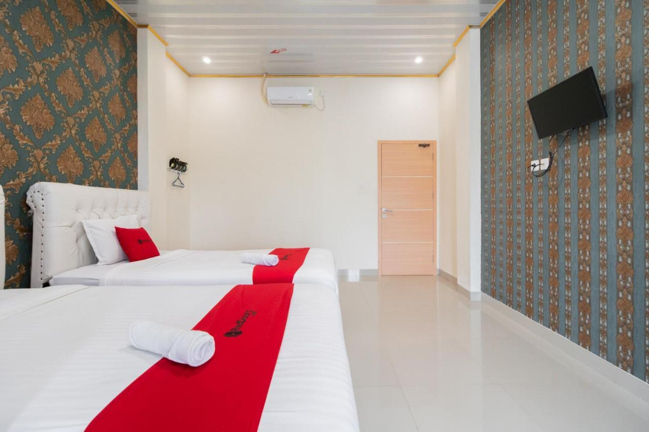 Отель Reddoorz Syariah Near Minangkabau International Aiport Паданг Экстерьер фото