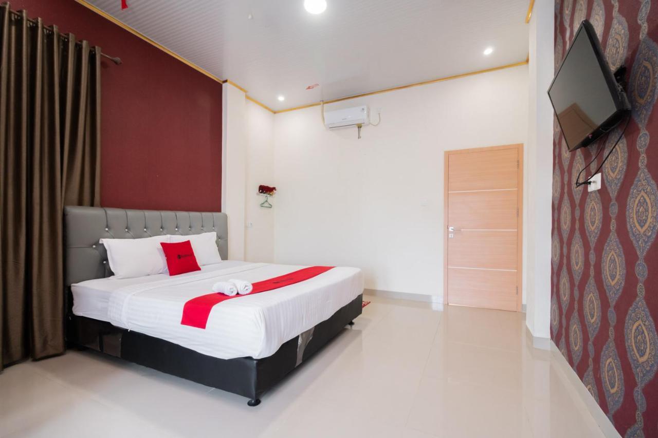 Отель Reddoorz Syariah Near Minangkabau International Aiport Паданг Экстерьер фото