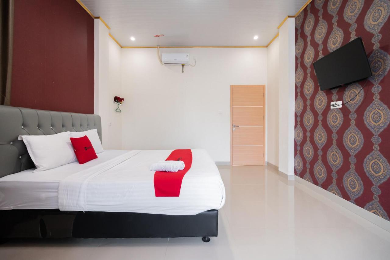 Отель Reddoorz Syariah Near Minangkabau International Aiport Паданг Экстерьер фото