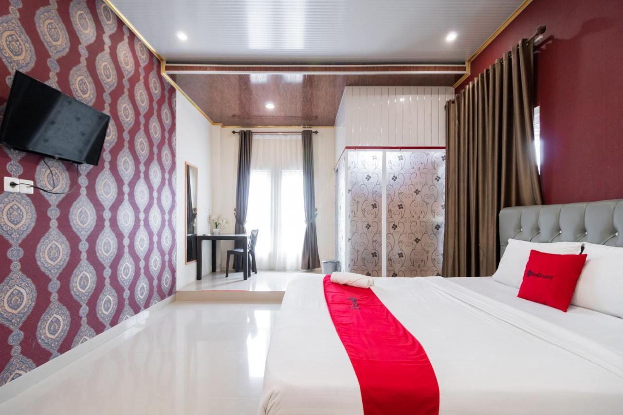 Отель Reddoorz Syariah Near Minangkabau International Aiport Паданг Экстерьер фото