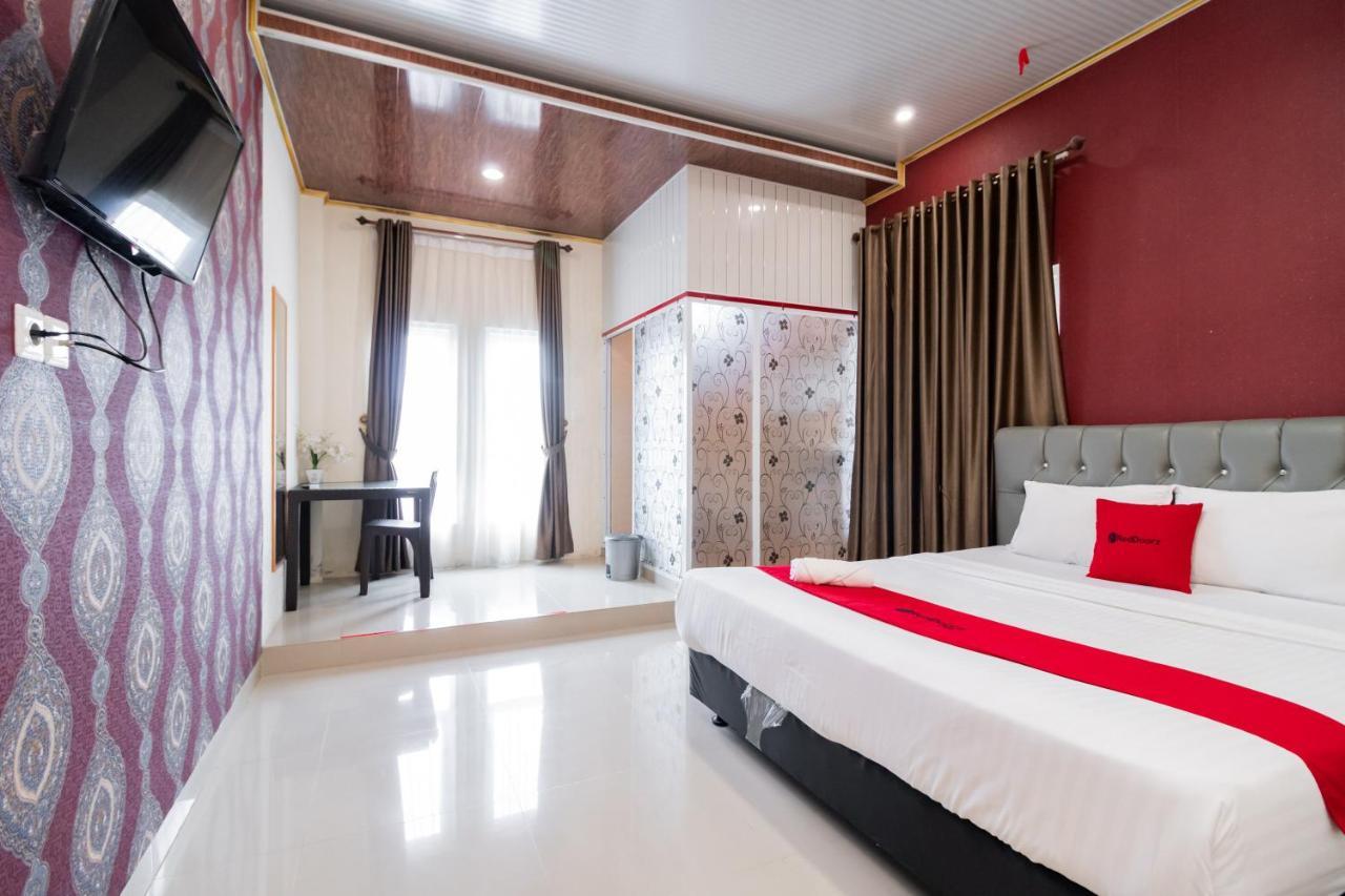Отель Reddoorz Syariah Near Minangkabau International Aiport Паданг Экстерьер фото