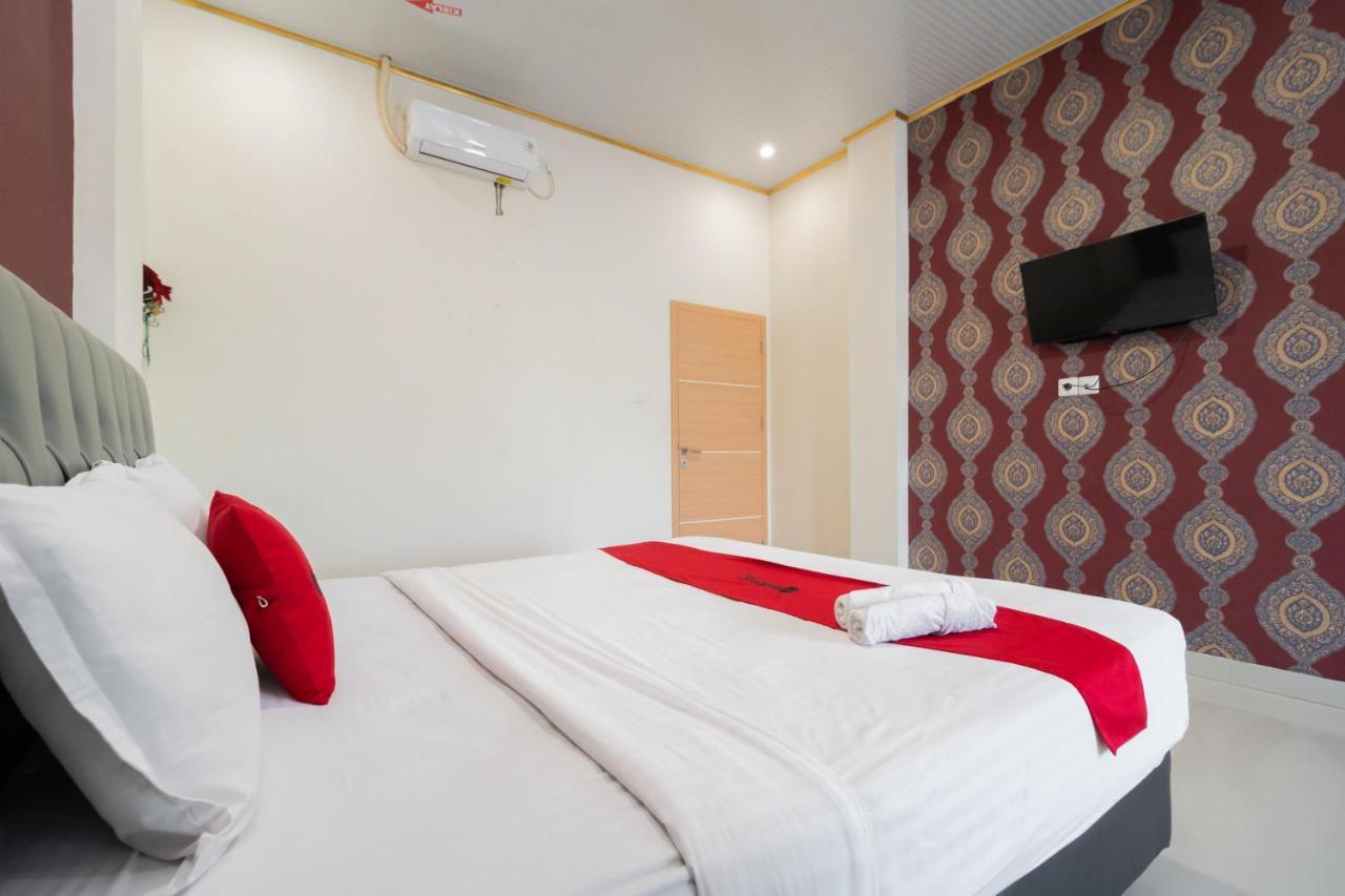 Отель Reddoorz Syariah Near Minangkabau International Aiport Паданг Экстерьер фото